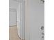 Bathroom features a white tiled shower and an open doorway to another room at 3527 Crestridge Dr, Charlotte, NC 28217
