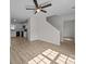 Open-concept living area features hardwood floors, neutral paint, and seamless transition to the kitchen at 3527 Crestridge Dr, Charlotte, NC 28217