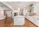 Gourmet kitchen with stainless steel appliances, granite countertops, and a functional center island at 4005 Capullo Ct, Matthews, NC 28104
