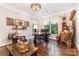 Comfortable office space with dark wood furniture, vintage decor and plenty of natural light at 4005 Capullo Ct, Matthews, NC 28104