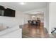 Bright living room with a view of the dining area and lots of natural light at 4013 Southern Pine Dr, Mount Holly, NC 28120
