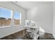 Bright office space with hardwood floors, natural light, and a modern desk setup at 4013 Southern Pine Dr, Mount Holly, NC 28120