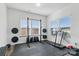 Bright workout room with a treadmill and lots of workout equipment at 4013 Southern Pine Dr, Mount Holly, NC 28120