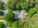 Aerial view of a home nestled among lush greenery, showcasing the expansive property and surrounding trees at 4075 Crepe Ridge Dr, Denver, NC 28037