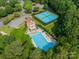Enjoy community amenities with a pool and tennis courts, all nestled amongst mature trees at 4075 Crepe Ridge Dr, Denver, NC 28037