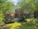 Spacious backyard featuring a deck with outdoor seating, perfect for relaxation and entertaining at 4075 Crepe Ridge Dr, Denver, NC 28037