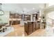 Gourmet kitchen with stainless steel appliances, granite countertops, custom cabinets, and a center island at 4075 Crepe Ridge Dr, Denver, NC 28037