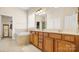 Spacious bathroom featuring double vanity, soaking tub and neutral tile at 4115 Birkshire Hts, Fort Mill, SC 29708