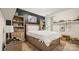 Stylish bedroom boasts built-in shelving and neutral colors at 4115 Birkshire Hts, Fort Mill, SC 29708