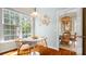 Bright dining area with hardwood floors, windows, and decorative touches at 4115 Birkshire Hts, Fort Mill, SC 29708