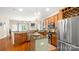 Spacious kitchen with granite countertops, stainless steel appliances, and open layout to living room at 4115 Birkshire Hts, Fort Mill, SC 29708