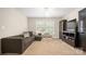 Relaxing living room featuring neutral tones, a comfortable sofa and lots of space at 4115 Birkshire Hts, Fort Mill, SC 29708