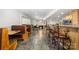 Finished basement features booth seating, a bar, game area, exercise equipment, and a kitchenette at 4201 Amber Leigh Way Dr, Charlotte, NC 28269