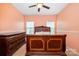 Bedroom showcases a wood bed frame, a dresser, carpeting, and neutral-colored walls at 4201 Amber Leigh Way Dr, Charlotte, NC 28269