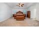 Large main bedroom suite with tray ceiling and decorative furniture at 4201 Amber Leigh Way Dr, Charlotte, NC 28269