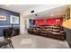 Basement theater room with comfortable seating and colorful decor at 4201 Amber Leigh Way Dr, Charlotte, NC 28269