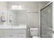 Updated bathroom featuring a marble vanity and walk-in shower at 4410 Burgin St, Kannapolis, NC 28081