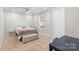 Cozy bedroom with a ceiling fan and natural light from a window at 4410 Burgin St, Kannapolis, NC 28081