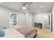 Bright bedroom with a ceiling fan, a window, and a desk area at 4410 Burgin St, Kannapolis, NC 28081