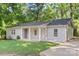 Well-maintained single Gathering home with a combination of brick and siding, complemented by a freshly cut lawn at 4410 Burgin St, Kannapolis, NC 28081