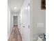 Inviting hallway featuring wood floors and white doors at 4410 Burgin St, Kannapolis, NC 28081
