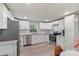 Updated kitchen featuring granite countertops, stainless steel appliances, and ample cabinet space at 4410 Burgin St, Kannapolis, NC 28081