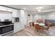 Modern living space with stainless appliances, cozy dining area, and comfortable living room at 4410 Burgin St, Kannapolis, NC 28081