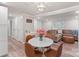 Inviting living space featuring a dining area, comfortable sofa, and ample closet storage at 4410 Burgin St, Kannapolis, NC 28081