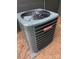 Goodman air conditioner sits on pine needles at 4421 Linwood Rd, Gastonia, NC 28052