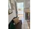 Entryway with decorative bench and a view into the kitchen at 4421 Linwood Rd, Gastonia, NC 28052