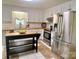 Spacious kitchen featuring stainless steel appliances and an island at 4421 Linwood Rd, Gastonia, NC 28052