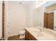 Well-lit bathroom features a vanity with a sink, a toilet, and a tiled shower/tub combination, offering comfort and convenience at 4518 Courtyard Blvd # 4, Harrisburg, NC 28075