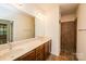 Bathroom featuring a double vanity and tiled walk-in shower at 4518 Courtyard Blvd # 4, Harrisburg, NC 28075