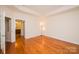 Bedroom featuring hardwood flooring and natural light at 4518 Courtyard Blvd # 4, Harrisburg, NC 28075