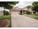 Lovely brick home with a manicured lawn, inviting front porch, and spacious driveway at 4518 Courtyard Blvd # 4, Harrisburg, NC 28075