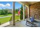 Charming front porch featuring comfortable rocking chairs and a view of the well-kept front yard at 463 Langston Place Dr, Fort Mill, SC 29708