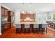 Modern kitchen with granite countertops, stainless steel appliances, a center island, and pendant lighting at 463 Langston Place Dr, Fort Mill, SC 29708