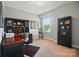 Home office featuring a built-in desk, shelving, and a window for natural light at 463 Langston Place Dr, Fort Mill, SC 29708