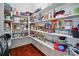 Walk-in pantry featuring ample shelving space for optimal storage and organization at 463 Langston Place Dr, Fort Mill, SC 29708