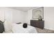 Bedroom featuring carpet flooring, a gray dresser, and decorative art at 4689 Fanning Rd, Hickory, NC 28602
