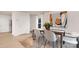 Cozy dining area with wooden table and chairs, complemented by soft lighting and stylish decor at 4689 Fanning Rd, Hickory, NC 28602