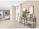 Inviting entryway with glass console table and mirrors, leading into a sunlit living space at 4689 Fanning Rd, Hickory, NC 28602