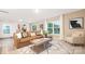 Comfortable living room with a sectional sofa, decorative pillows, and bright natural lighting at 4689 Fanning Rd, Hickory, NC 28602