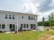 Backyard with patio and green grass at 502 Webster Ln, Cramerton, NC 28032