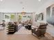 Bright living room with contemporary decor, large windows, and sleek furnishings at 502 Webster Ln, Cramerton, NC 28032