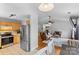 Open-concept living space showcasing the kitchen, dining area, and living room at 510 Sw Viking Sw Pl, Concord, NC 28025