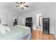 Main bedroom featuring hardwood floors and ensuite bathroom access at 510 Sw Viking Sw Pl, Concord, NC 28025