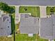 Aerial view of a home and its property showcasing the roof, lawn, driveway, and landscaping at 511 Rough Hewn Ln, Rock Hill, SC 29730