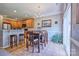 Bright dining area features tile flooring, modern light fixture, and sliding glass doors to the exterior at 511 Rough Hewn Ln, Rock Hill, SC 29730