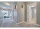Hallway with natural light, neutral tones, and easy access to rooms at 511 Rough Hewn Ln, Rock Hill, SC 29730